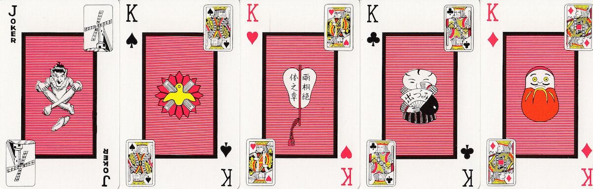 Five cards, one a joker and the other four being kings with various objects depicted.