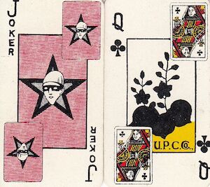 Two small playing cards, the first a joker with a person in a robber-mask inside a star shape, and the second a paulownia card with yellow background and the words “U.P.C. Co.”