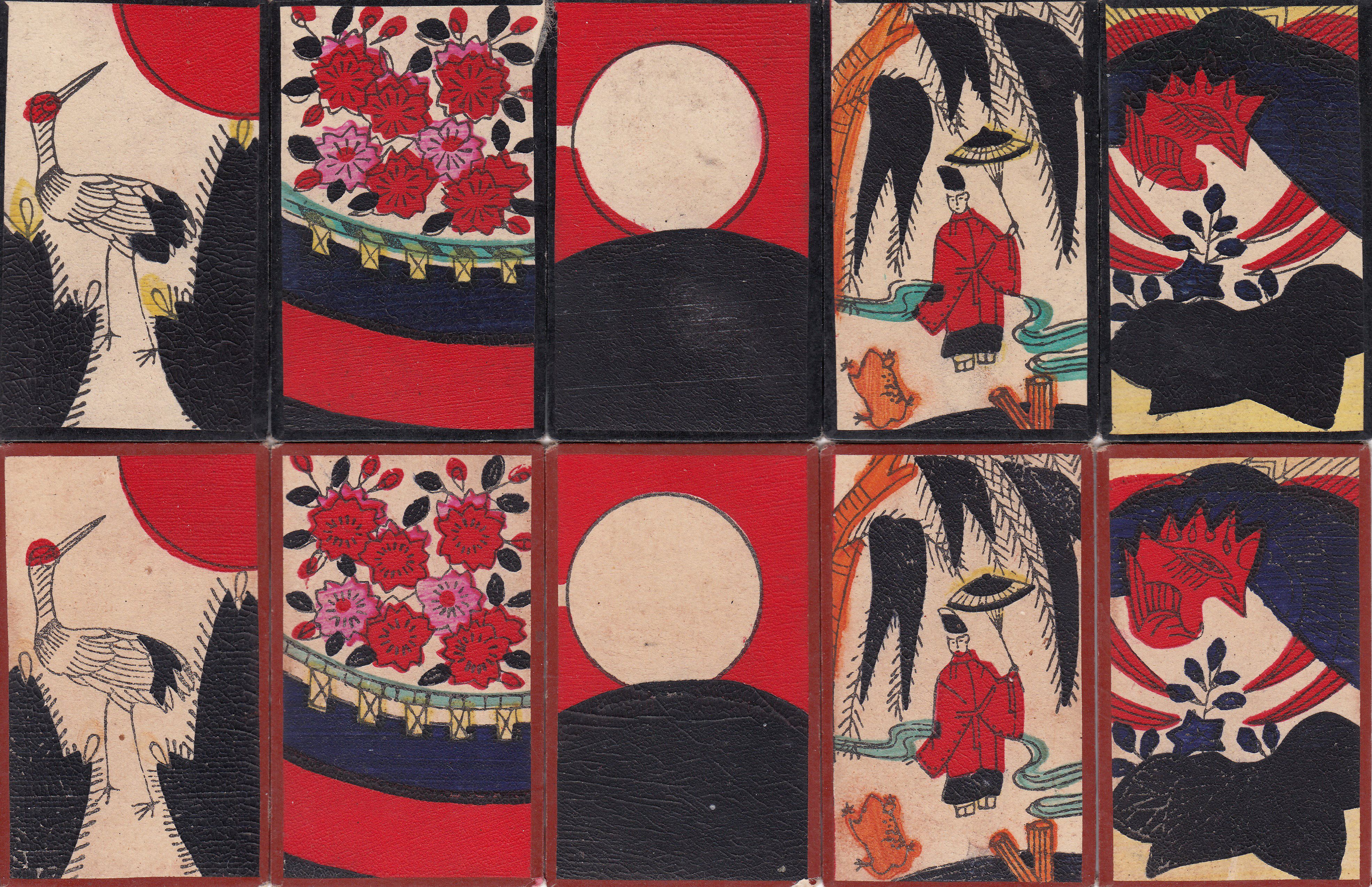 Two sets of Hanafuda cards with colours printed by hand, indicated by streaks in the inks.