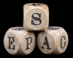 Three dice with the letters P A C E R S on them.