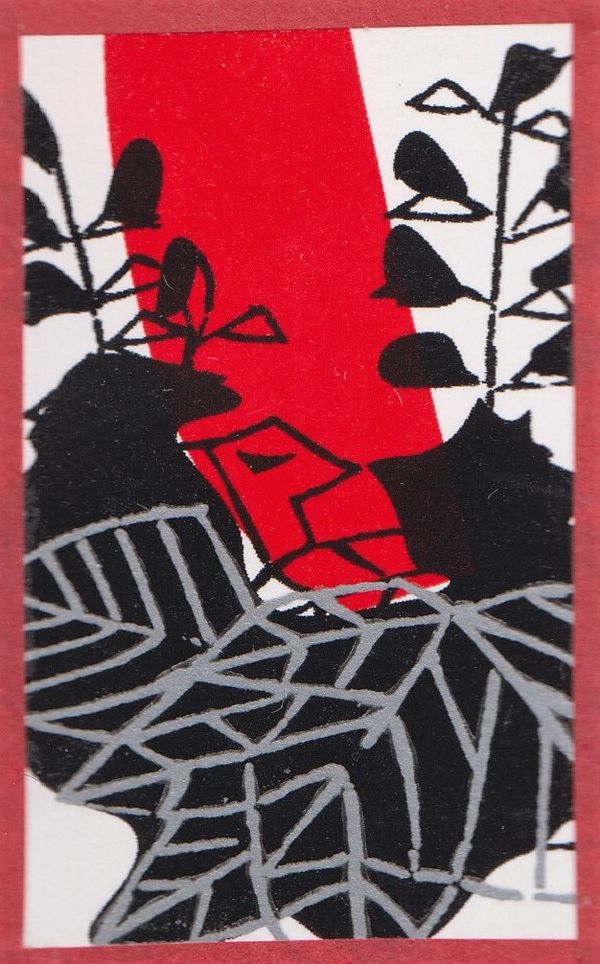 A small Hanafuda card depicting Paulownia with a large red streak across it.